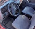 Красный Форд Эскорт, объемом двигателя 1.4 л и пробегом 150 тыс. км за 1200 $, фото 5 на Automoto.ua