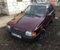 Красный Форд Эскорт, объемом двигателя 1.4 л и пробегом 150 тыс. км за 911 $, фото 1 на Automoto.ua