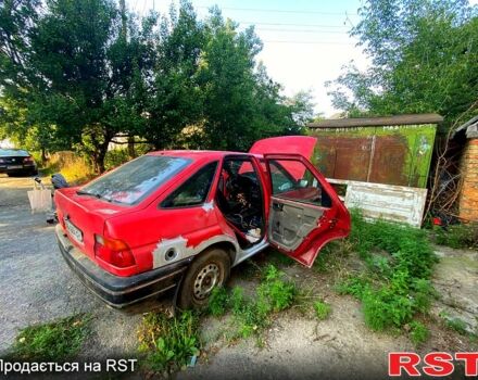 Красный Форд Эскорт, объемом двигателя 1.4 л и пробегом 100 тыс. км за 650 $, фото 4 на Automoto.ua