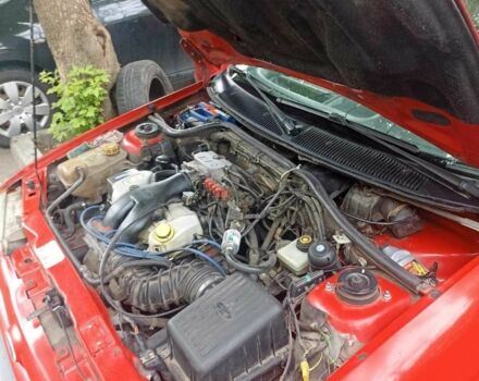 Красный Форд Эскорт, объемом двигателя 0.16 л и пробегом 90 тыс. км за 1500 $, фото 2 на Automoto.ua