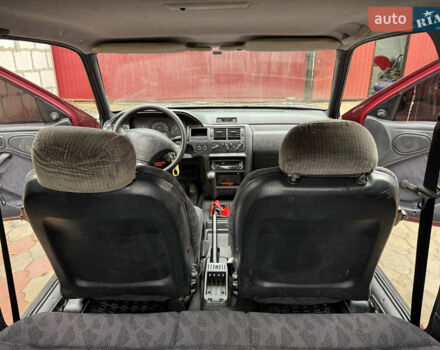 Красный Форд Эскорт, объемом двигателя 1.8 л и пробегом 55 тыс. км за 1500 $, фото 19 на Automoto.ua