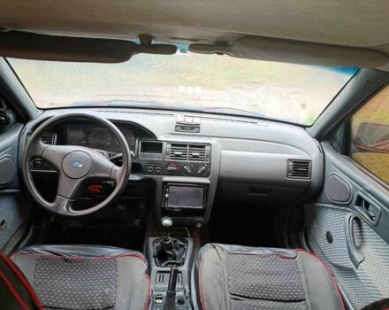 Красный Форд Эскорт, объемом двигателя 1.4 л и пробегом 300 тыс. км за 950 $, фото 5 на Automoto.ua