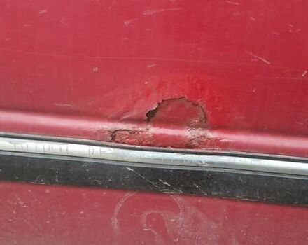 Красный Форд Эскорт, объемом двигателя 1.39 л и пробегом 100 тыс. км за 1100 $, фото 1 на Automoto.ua