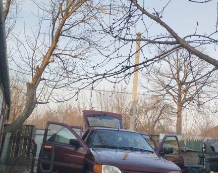 Красный Форд Эскорт, объемом двигателя 1.6 л и пробегом 100 тыс. км за 1200 $, фото 1 на Automoto.ua