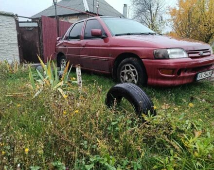 Красный Форд Эскорт, объемом двигателя 1.4 л и пробегом 300 тыс. км за 950 $, фото 1 на Automoto.ua