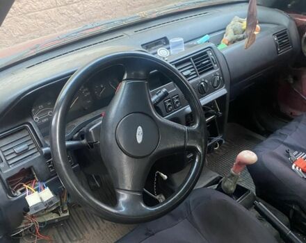 Красный Форд Эскорт, объемом двигателя 1.4 л и пробегом 500 тыс. км за 362 $, фото 5 на Automoto.ua