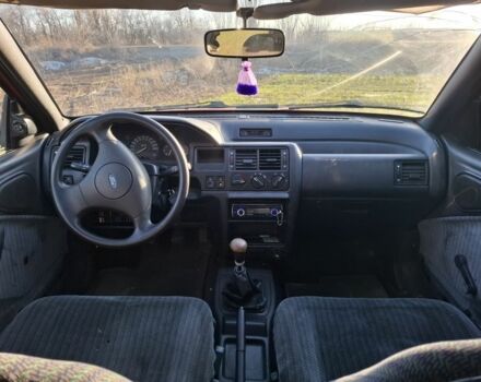 Красный Форд Эскорт, объемом двигателя 1.8 л и пробегом 100 тыс. км за 998 $, фото 5 на Automoto.ua