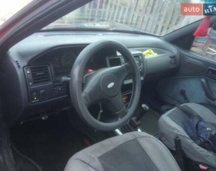 Красный Форд Эскорт, объемом двигателя 1.4 л и пробегом 233 тыс. км за 850 $, фото 14 на Automoto.ua