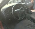 Красный Форд Эскорт, объемом двигателя 1.4 л и пробегом 87 тыс. км за 1000 $, фото 3 на Automoto.ua