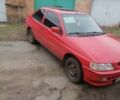 Красный Форд Эскорт, объемом двигателя 1.6 л и пробегом 300 тыс. км за 1500 $, фото 1 на Automoto.ua