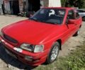 Красный Форд Эскорт, объемом двигателя 1.3 л и пробегом 100 тыс. км за 550 $, фото 1 на Automoto.ua