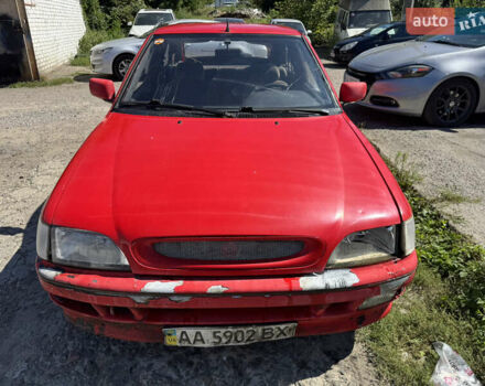 Красный Форд Эскорт, объемом двигателя 1.3 л и пробегом 100 тыс. км за 600 $, фото 4 на Automoto.ua