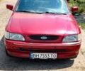 Красный Форд Эскорт, объемом двигателя 1.4 л и пробегом 300 тыс. км за 850 $, фото 1 на Automoto.ua