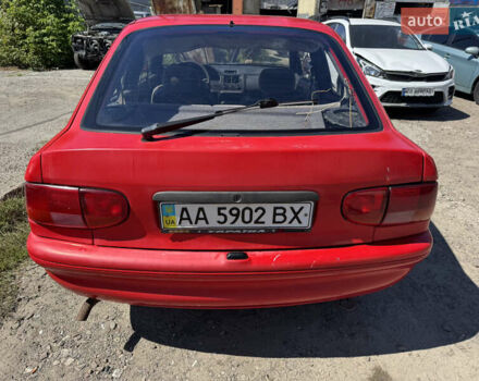 Красный Форд Эскорт, объемом двигателя 1.3 л и пробегом 100 тыс. км за 600 $, фото 1 на Automoto.ua
