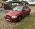Красный Форд Эскорт, объемом двигателя 1.6 л и пробегом 230 тыс. км за 1400 $, фото 1 на Automoto.ua