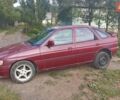 Красный Форд Эскорт, объемом двигателя 1.6 л и пробегом 276 тыс. км за 700 $, фото 1 на Automoto.ua