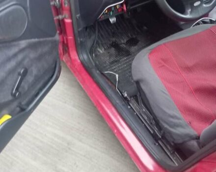 Красный Форд Эскорт, объемом двигателя 1.39 л и пробегом 997 тыс. км за 1333 $, фото 2 на Automoto.ua