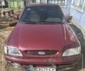 Червоний Форд Ескорт, об'ємом двигуна 1.4 л та пробігом 250 тис. км за 1174 $, фото 1 на Automoto.ua