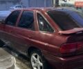 Красный Форд Эскорт, объемом двигателя 1.6 л и пробегом 300 тыс. км за 750 $, фото 1 на Automoto.ua