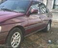 Красный Форд Эскорт, объемом двигателя 1.4 л и пробегом 300 тыс. км за 1100 $, фото 1 на Automoto.ua
