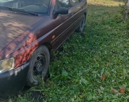 Червоний Форд Ескорт, об'ємом двигуна 1.8 л та пробігом 79 тис. км за 1100 $, фото 1 на Automoto.ua