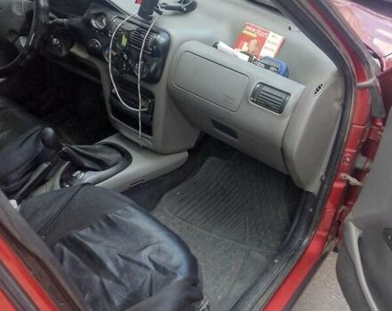 Красный Форд Эскорт, объемом двигателя 1.4 л и пробегом 120 тыс. км за 1900 $, фото 9 на Automoto.ua