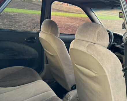 Червоний Форд Ескорт, об'ємом двигуна 1.4 л та пробігом 305 тис. км за 1200 $, фото 7 на Automoto.ua