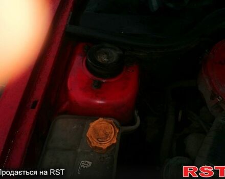 Красный Форд Эскорт, объемом двигателя 1.3 л и пробегом 300 тыс. км за 1500 $, фото 4 на Automoto.ua