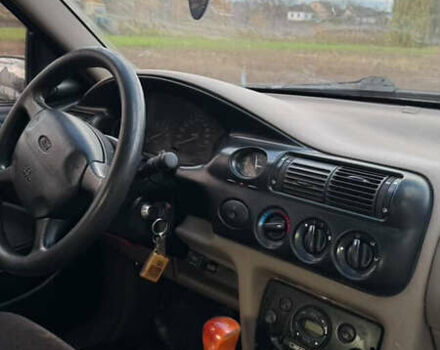 Червоний Форд Ескорт, об'ємом двигуна 1.4 л та пробігом 305 тис. км за 1200 $, фото 8 на Automoto.ua
