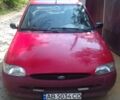 Красный Форд Эскорт, объемом двигателя 1.4 л и пробегом 260 тыс. км за 1900 $, фото 1 на Automoto.ua