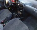 Красный Форд Эскорт, объемом двигателя 1.3 л и пробегом 150 тыс. км за 1700 $, фото 2 на Automoto.ua