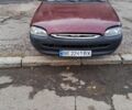 Красный Форд Эскорт, объемом двигателя 1.6 л и пробегом 350 тыс. км за 1150 $, фото 1 на Automoto.ua