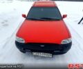 Красный Форд Эскорт, объемом двигателя 1.4 л и пробегом 250 тыс. км за 600 $, фото 1 на Automoto.ua