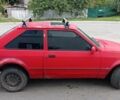Красный Форд Эскорт, объемом двигателя 1.4 л и пробегом 300 тыс. км за 650 $, фото 1 на Automoto.ua