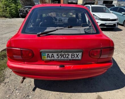Красный Форд Эскорт, объемом двигателя 1.3 л и пробегом 150 тыс. км за 950 $, фото 1 на Automoto.ua