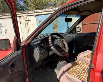 Красный Форд Эскорт, объемом двигателя 1.3 л и пробегом 150 тыс. км за 1400 $, фото 4 на Automoto.ua
