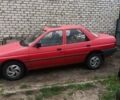 Красный Форд Эскорт, объемом двигателя 1.4 л и пробегом 100 тыс. км за 1000 $, фото 1 на Automoto.ua