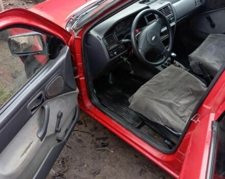 Красный Форд Эскорт, объемом двигателя 1.4 л и пробегом 100 тыс. км за 400 $, фото 7 на Automoto.ua