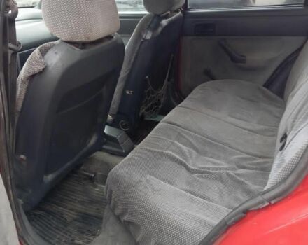 Красный Форд Эскорт, объемом двигателя 1.4 л и пробегом 100 тыс. км за 400 $, фото 6 на Automoto.ua