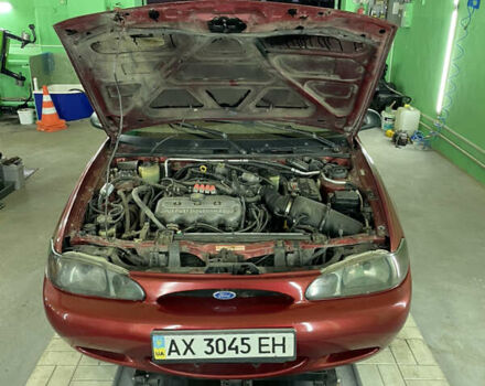 Красный Форд Эскорт, объемом двигателя 2 л и пробегом 216 тыс. км за 2500 $, фото 14 на Automoto.ua