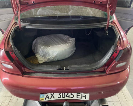 Красный Форд Эскорт, объемом двигателя 2 л и пробегом 216 тыс. км за 2500 $, фото 42 на Automoto.ua