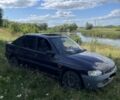 Красный Форд Эскорт, объемом двигателя 1.3 л и пробегом 1 тыс. км за 900 $, фото 1 на Automoto.ua