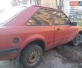 Красный Форд Эскорт, объемом двигателя 1.3 л и пробегом 333 тыс. км за 250 $, фото 1 на Automoto.ua