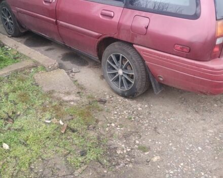 Красный Форд Эскорт, объемом двигателя 1.9 л и пробегом 190 тыс. км за 994 $, фото 1 на Automoto.ua