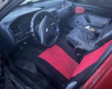 Красный Форд Эскорт, объемом двигателя 1.6 л и пробегом 400 тыс. км за 600 $, фото 1 на Automoto.ua