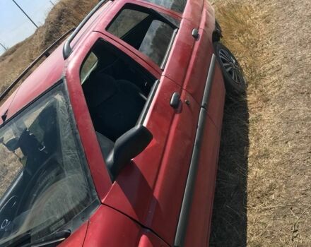 Красный Форд Эскорт, объемом двигателя 1.4 л и пробегом 68 тыс. км за 628 $, фото 1 на Automoto.ua