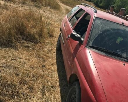 Красный Форд Эскорт, объемом двигателя 1.4 л и пробегом 68 тыс. км за 628 $, фото 5 на Automoto.ua