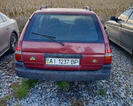 Красный Форд Эскорт, объемом двигателя 1.6 л и пробегом 300 тыс. км за 850 $, фото 1 на Automoto.ua