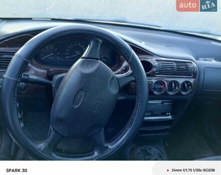 Красный Форд Эскорт, объемом двигателя 1.6 л и пробегом 300 тыс. км за 850 $, фото 5 на Automoto.ua