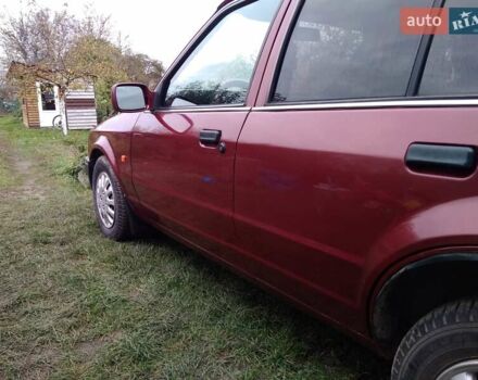 Червоний Форд Ескорт, об'ємом двигуна 1.39 л та пробігом 93 тис. км за 1325 $, фото 24 на Automoto.ua
